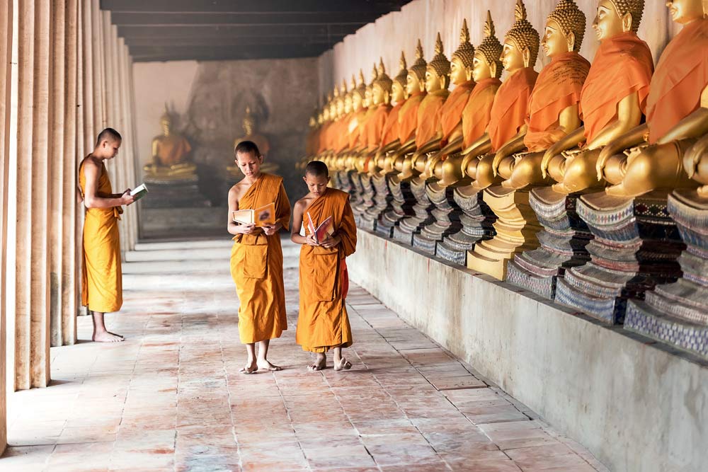 Buddhists in a temple in Thailand